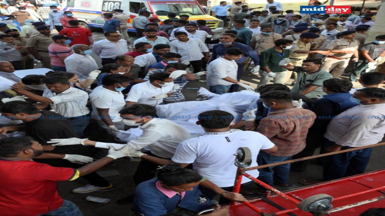 Families gather outside Ahmedabad's Civil Hospital, anxiously waiting for news about their loved ones after the devastating plane crash
