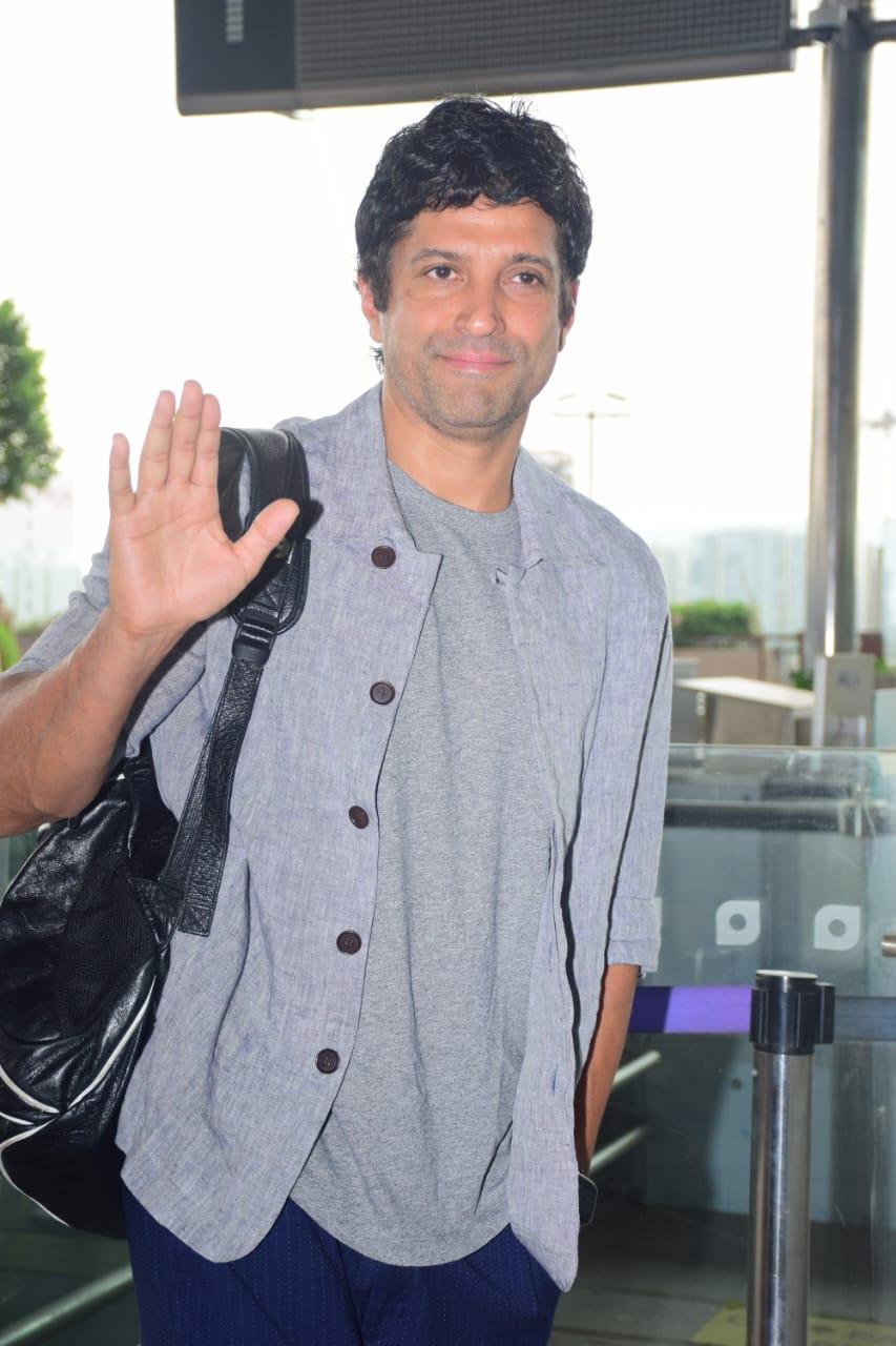 Farhan Akhtar looked sharp in a stylish outfit as he was snapped at Mumbai airport. The actor waved at the paparazzi stationed before entering the airport