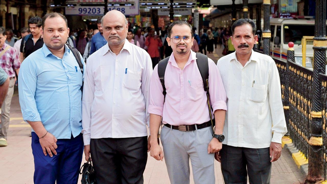 Dinesh Mohite (pink T-shirt) and his friends all travel together from Titwala  to CSMT. Pics/Sayyed Sameer Abedi