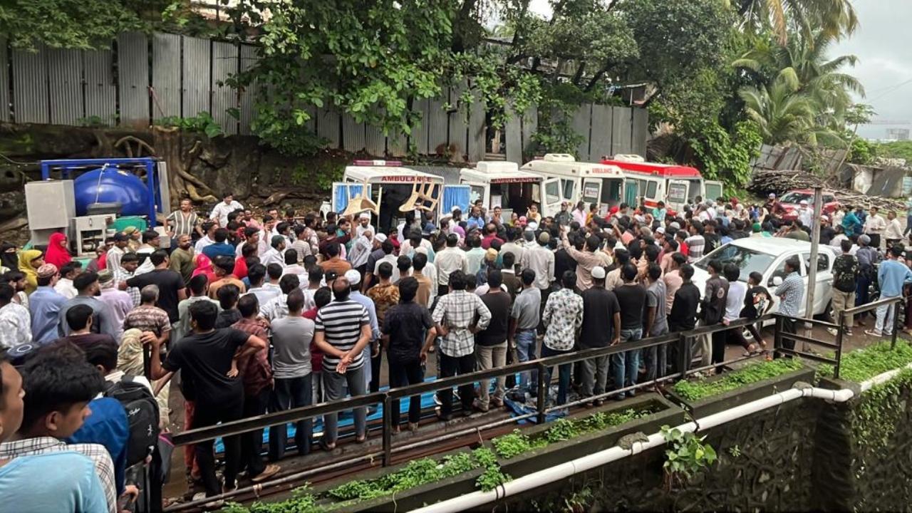 Neighbours and relatives gathered at the family's former home to pay their last respects. Many remembered the Syed's family as humble and cheerful