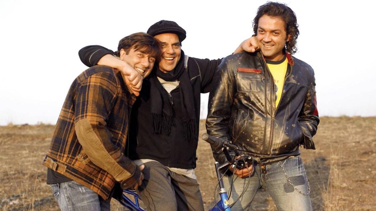 Dharmendra and sons in Apne
In Apne (2007), Dharmendra, Sunny Deol, and Bobby Deol played a father and sons navigating dreams, redemption, and legacy. The sports drama drew strength from their real-life bond, with Dharmendra as a former boxer finding hope through his children. Their emotional performances gave the story genuine depth and sincerity