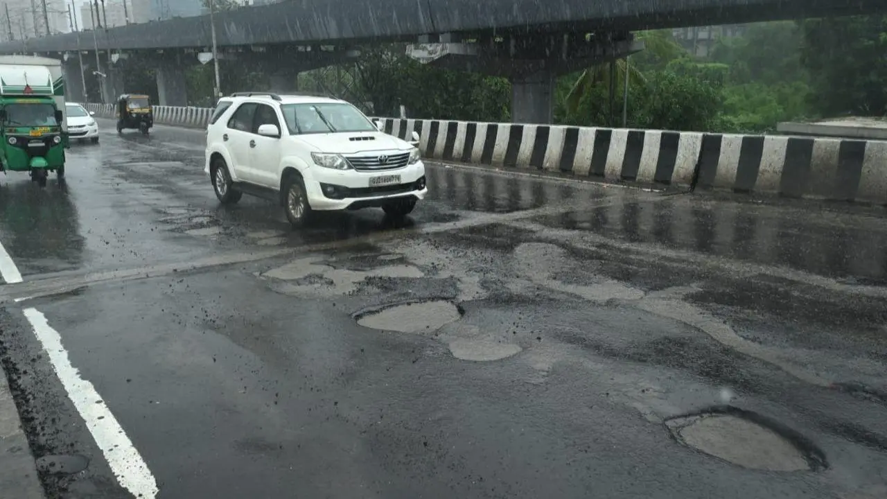 Mumbai Rains LIVE Updates: Potholes appear on Dattapada flyover in Borivali