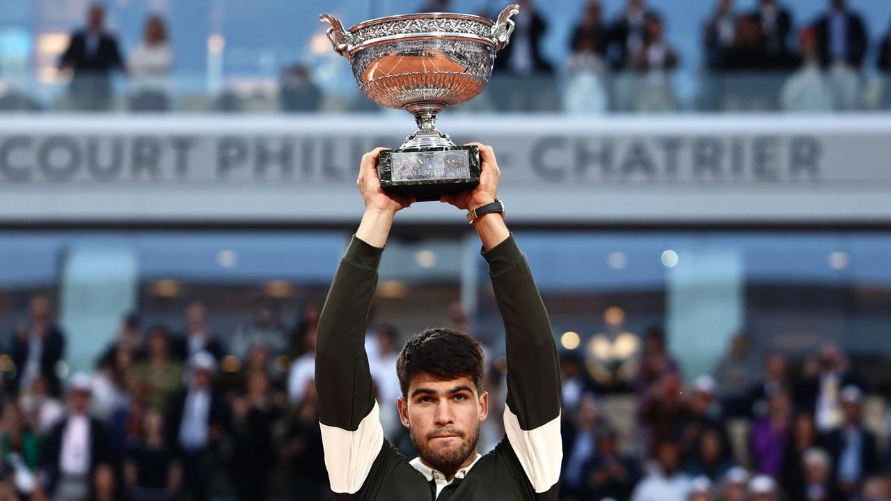 Carlos Alcaraz saves three match points to beat Jannik Sinner to French Open title