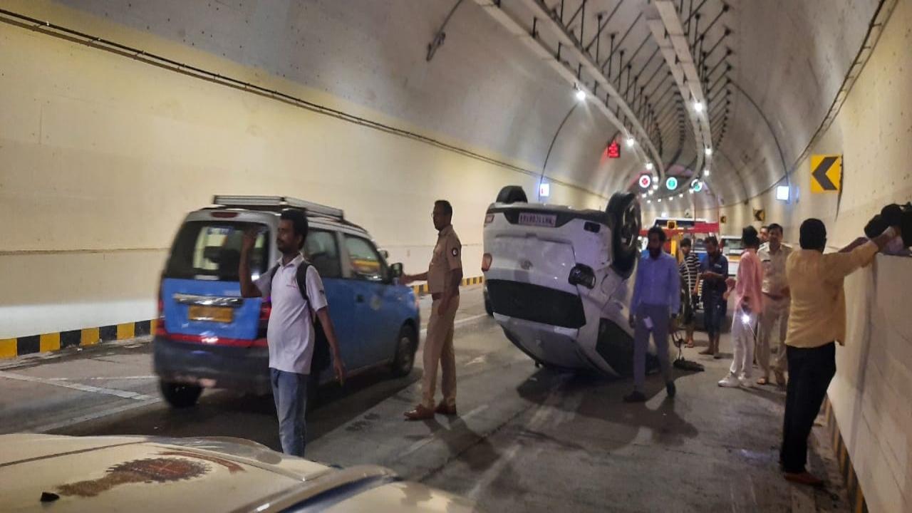 WATCH: Car overturns inside coastal road tunnel; driver suffers minor injuries
