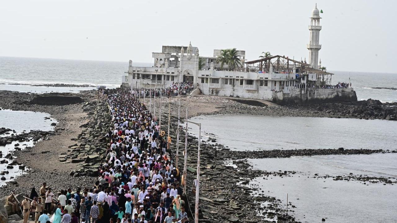 Thousands of people, including families and visitors from other cities, came to offer prayers and seek blessings at the revered shrine of Haji Ali, located on an islet off the coast in Mumbai