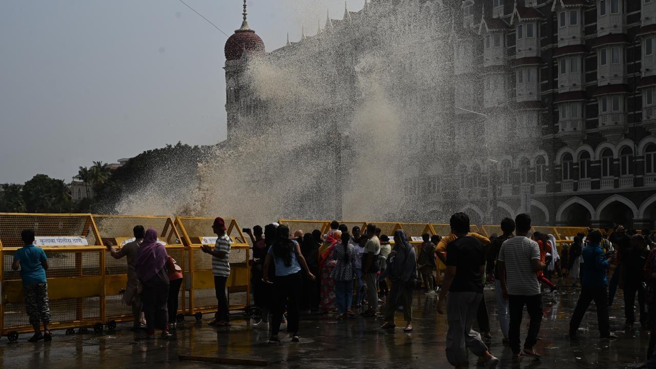 The high tide, coupled with rainfall at regular intervals, caused sea water to crash against the promenade