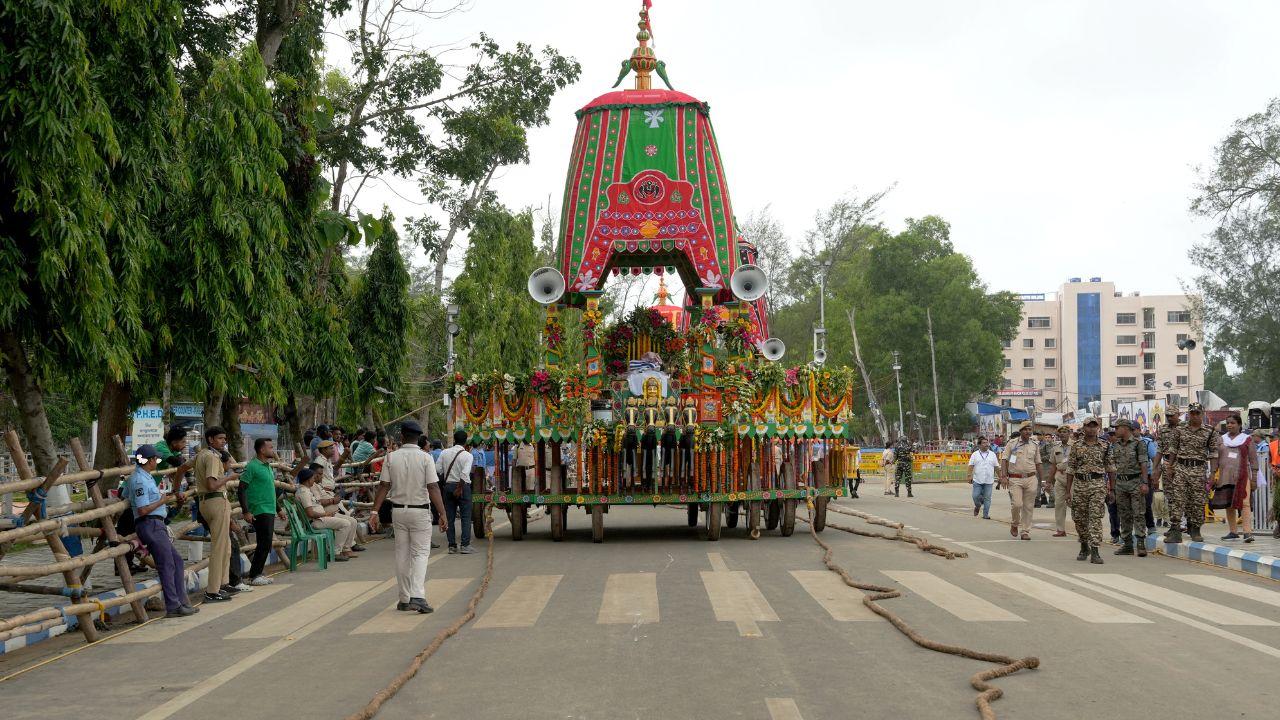 Accompanied by monks of the temple and others, West Bengal Chief Minister Mamata Banerjee performs the ritual