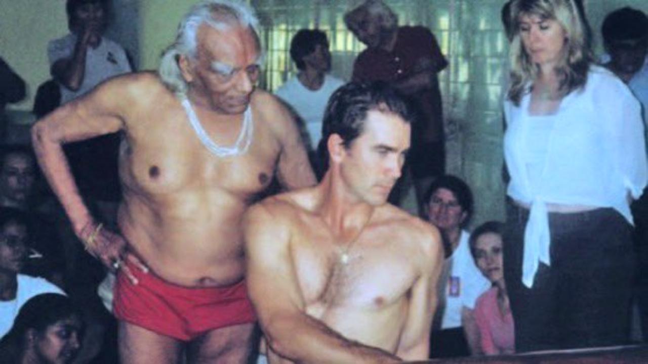 Justin Langer, the gritty former Australian opener, is pictured alongside legendary yoga guru B.K.S. Iyengar