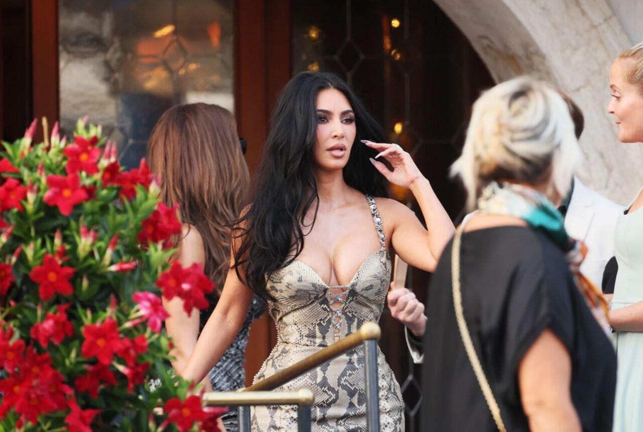 Kim Kardashian
Kim Kardashian stunned in a plunging reptile-print dress as she joined the star-studded guest list at Bezos’s waterfront wedding bash