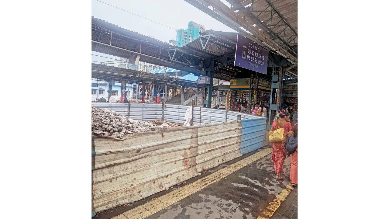 A central section of platform  2 and platform 3 at Goregaon railway station lacks a roof as an old staircase landing is being removed. Commuters have demanded temporary cover to withstand the rain