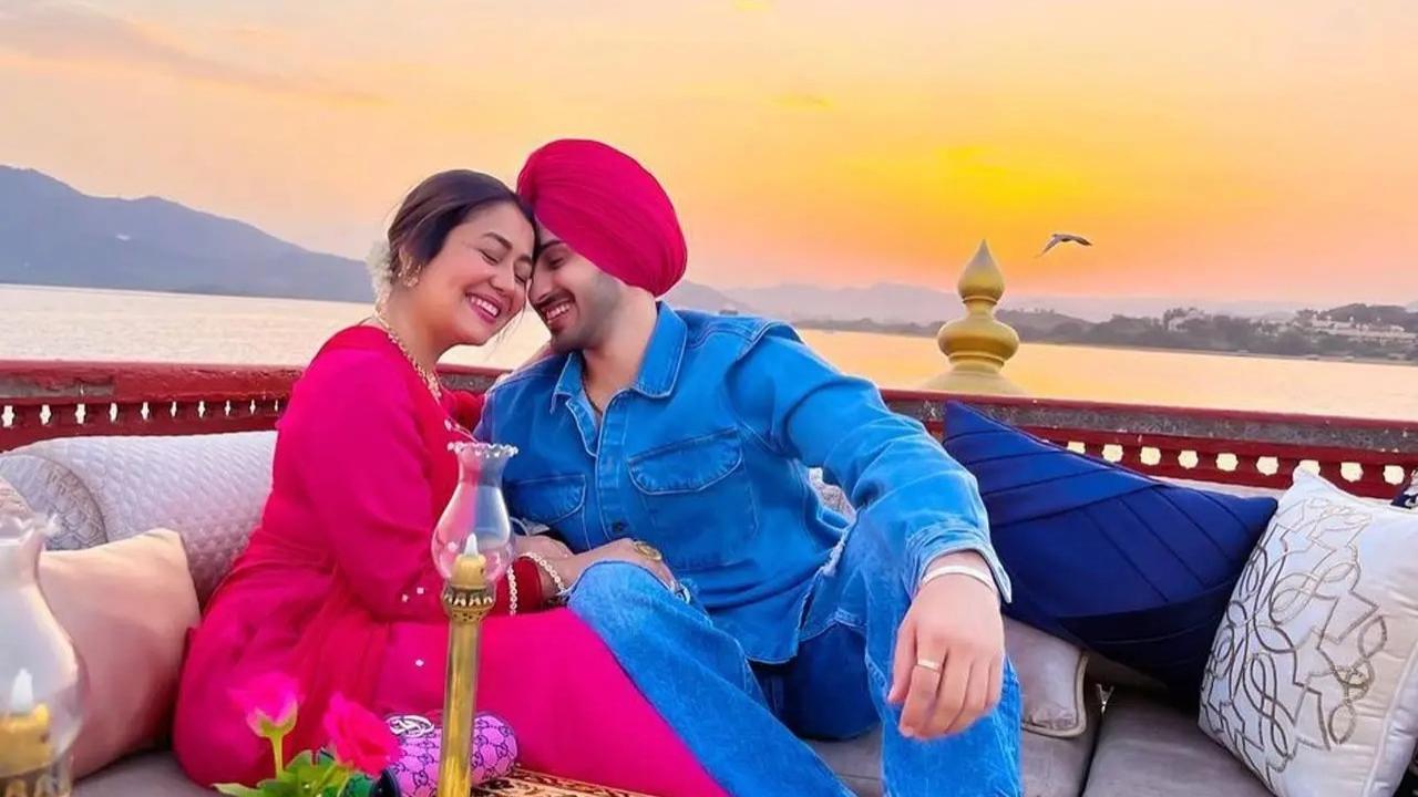 A beautiful candid of the couple in enchanting traditional wear, framed against a gorgeous sunset—pure magic captured in a single moment