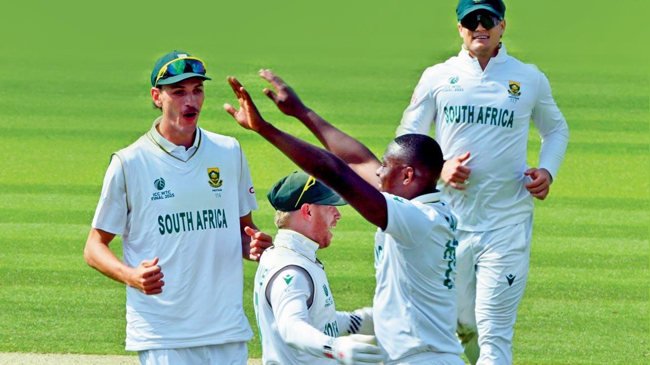 South Africa’s Kagiso Rabada (second from right) celebrates an Australia wicket with teammates at  Lord’s yesterday. Pic/Bipin Patel	