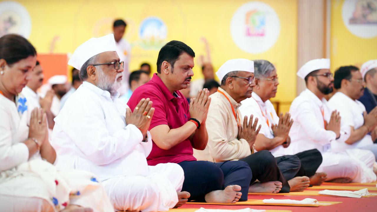 Maharashtra CM Devendra Fadnavis attended the ‘Warkari BhaktiYog’ program on International Yoga Day, alongside Minister Chandrakant Patil, MoS Madhuri Misal, Prof Sadanand More, and other dignitaries