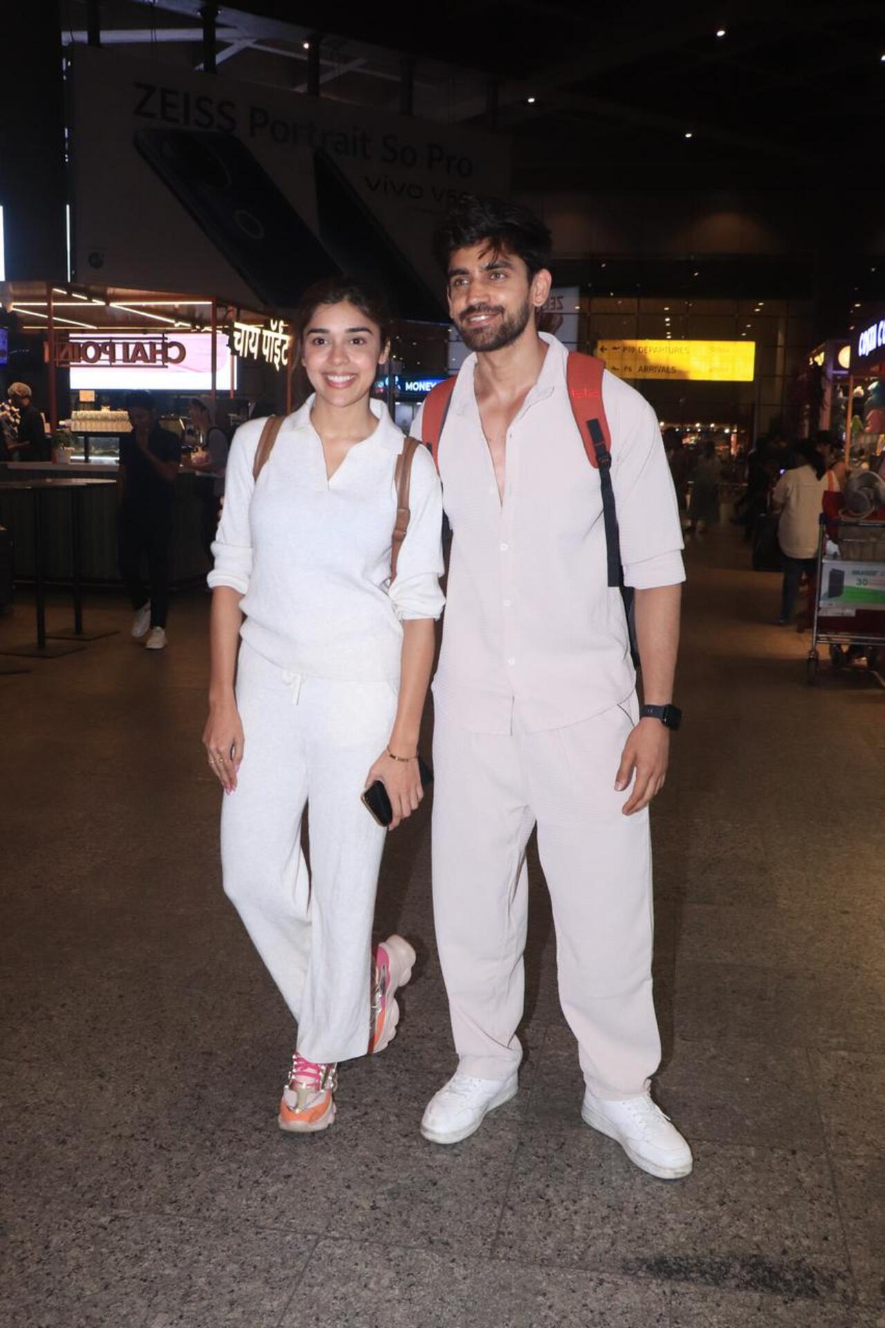 Bigg Boss fame Eisha Singh & Avinash spotted in white at the airport