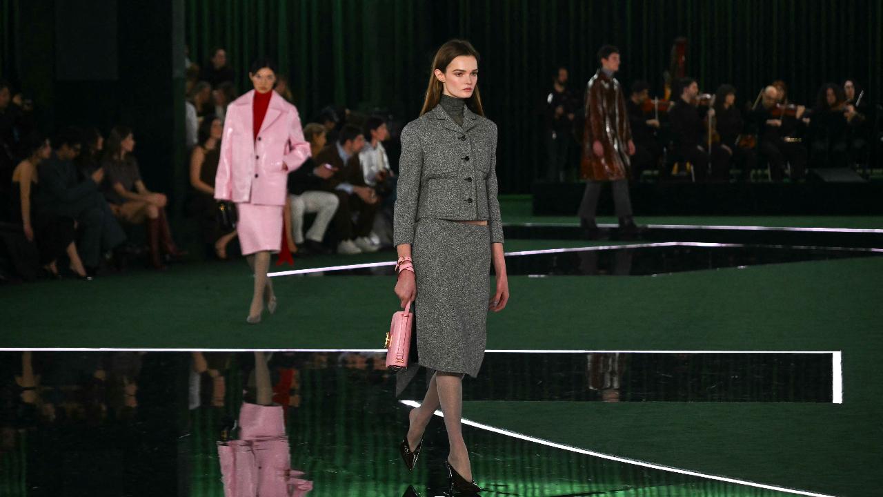 Just like its men's suits -- some contemporary, some in seventies style -- Gucci followed the same pattern for classic women's ensembles, with small jackets and knee-length skirts complemented by a pretty integral tunic emblazoned with the double GG.