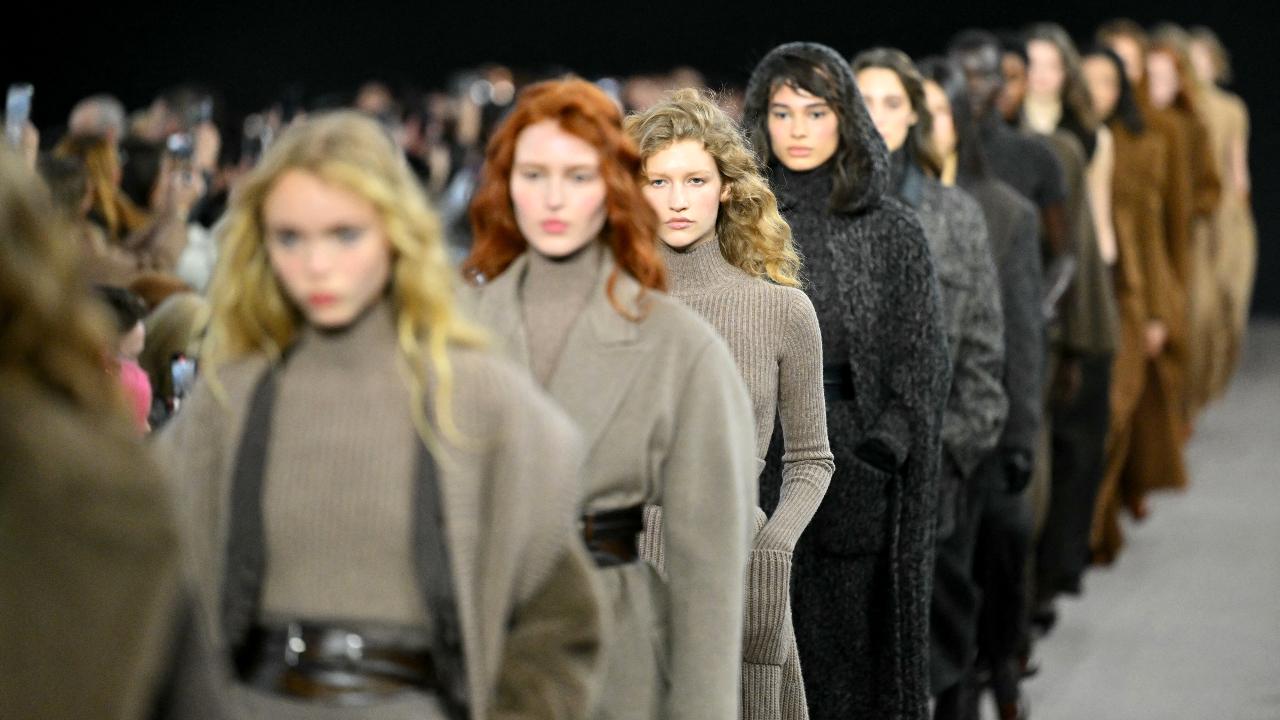 Max Mara's collection highlighted flecked grey cardigans and dresses made from thick wool.