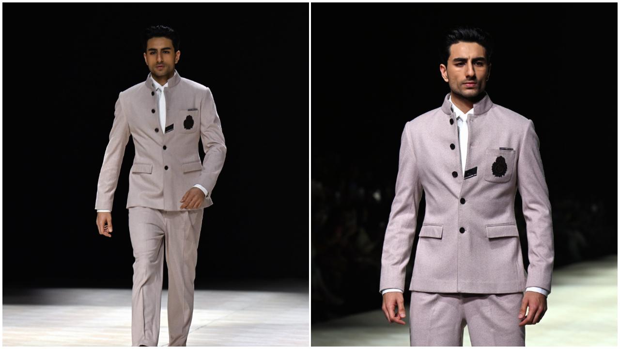 Making an impressive entry, showstopper Ibrahim Ali Khan walked confidently down the runway, donning a beige ensemble, which featured a bandhgala jacket and matching structured trousers, paired with a white shirt.