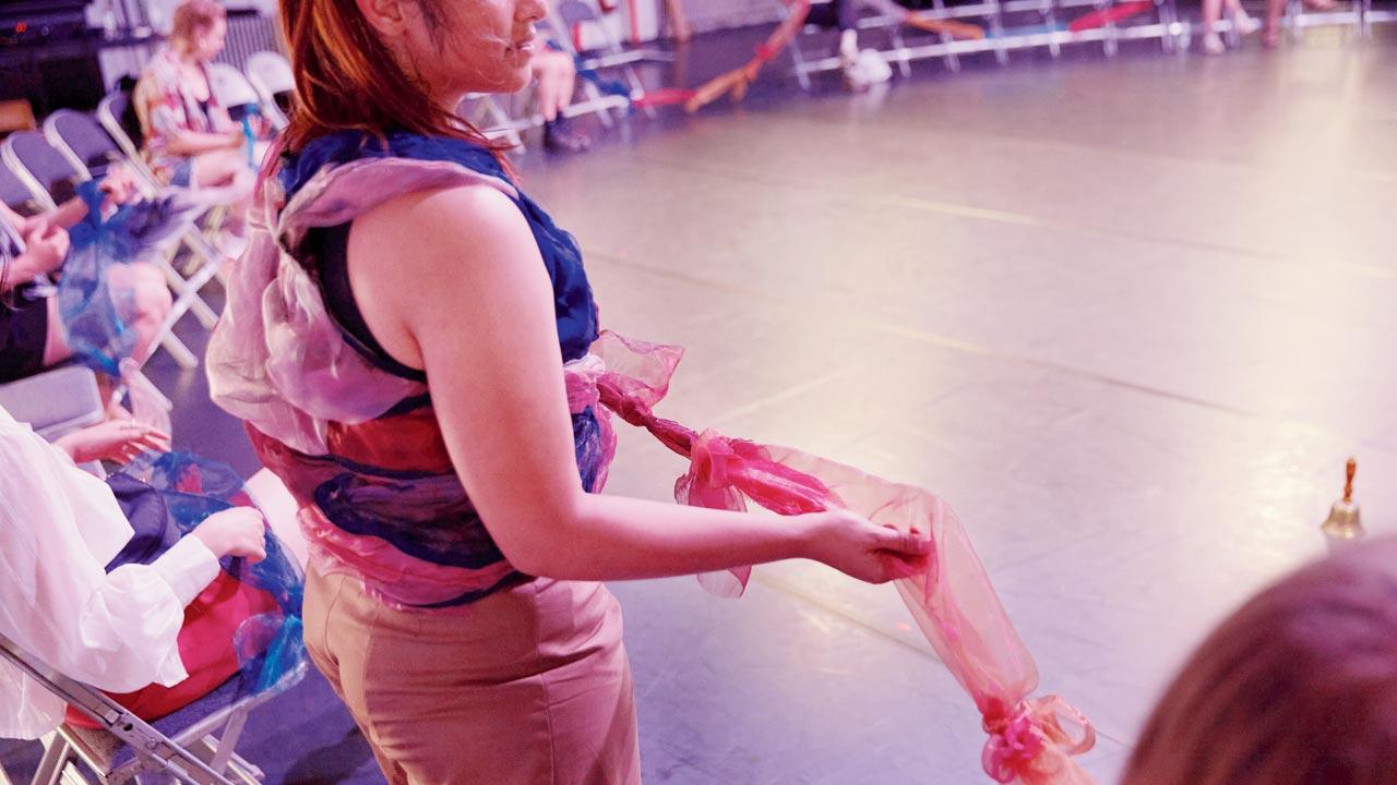Props are used as tactile tools in the performance