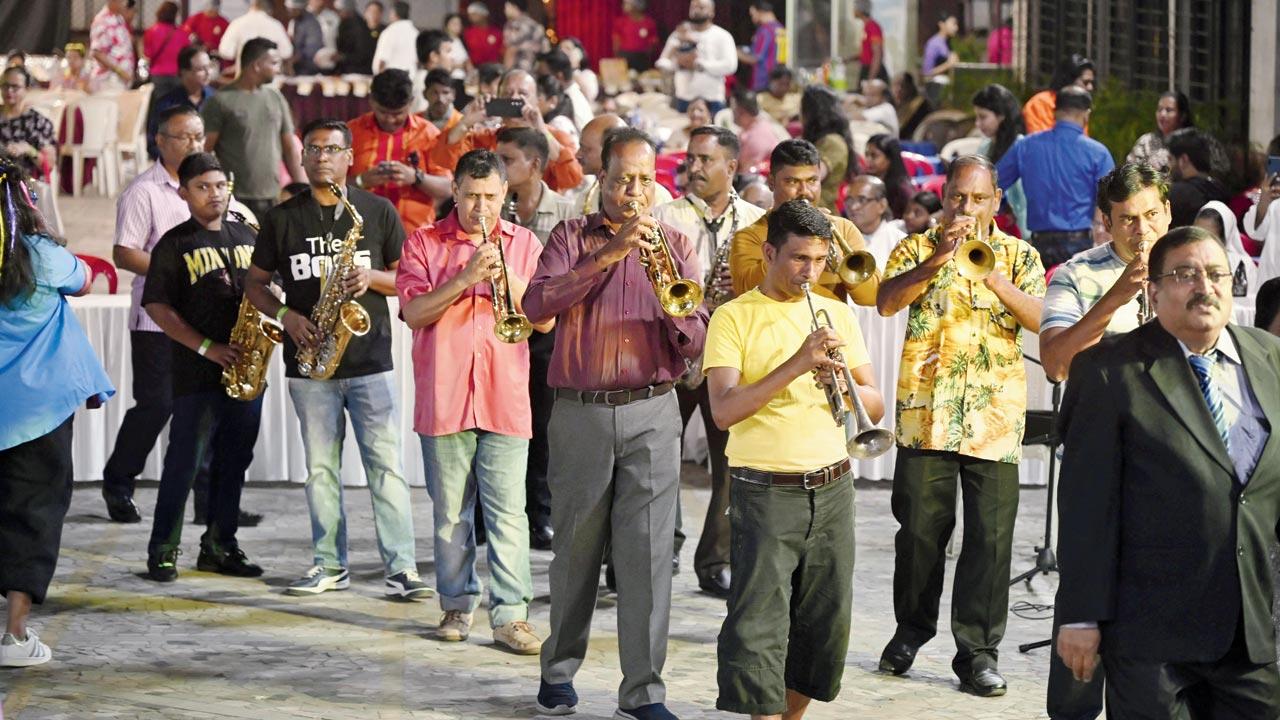 The Our Lady of Health Brass Band sets the tone for the evening