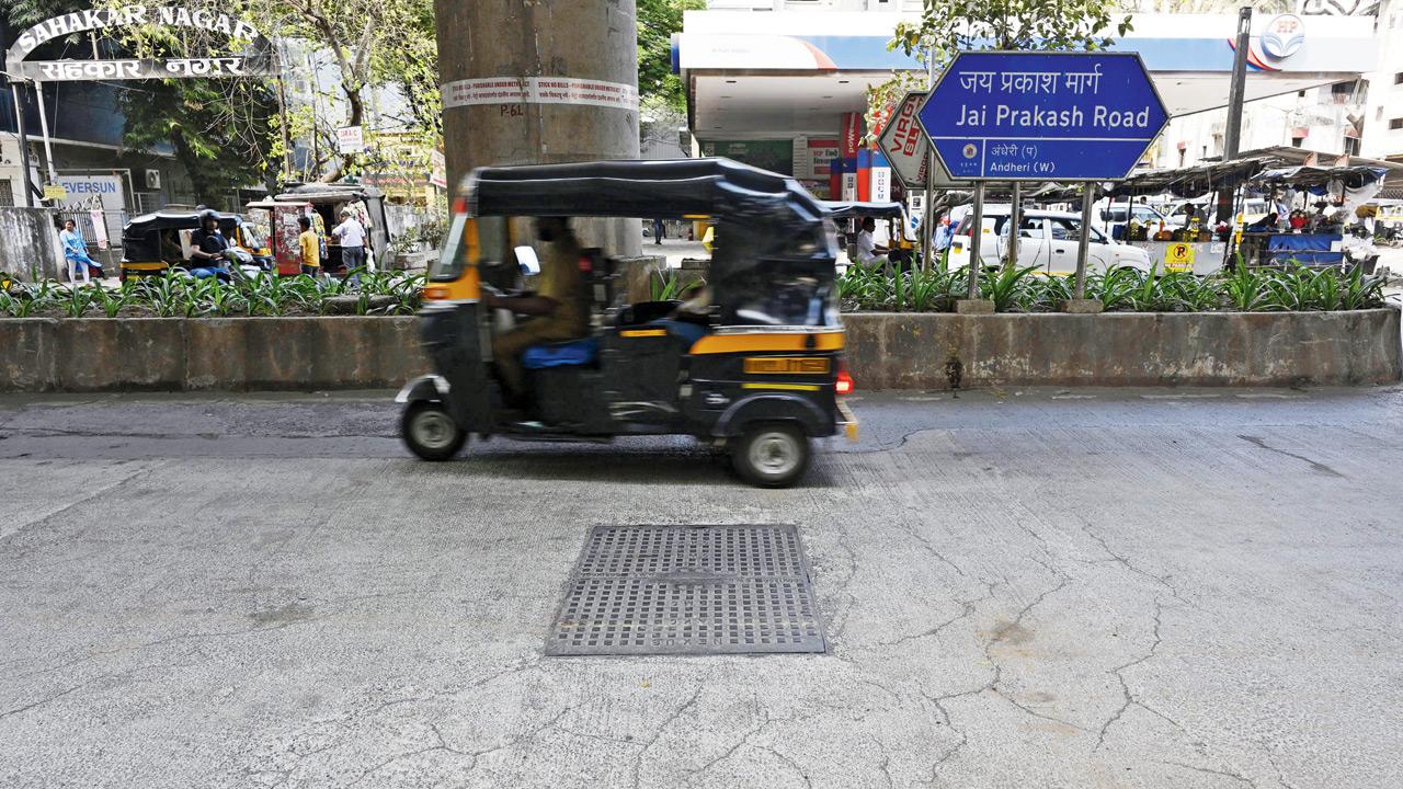 A visibly cracked Jai Prakash Road in Andheri West 