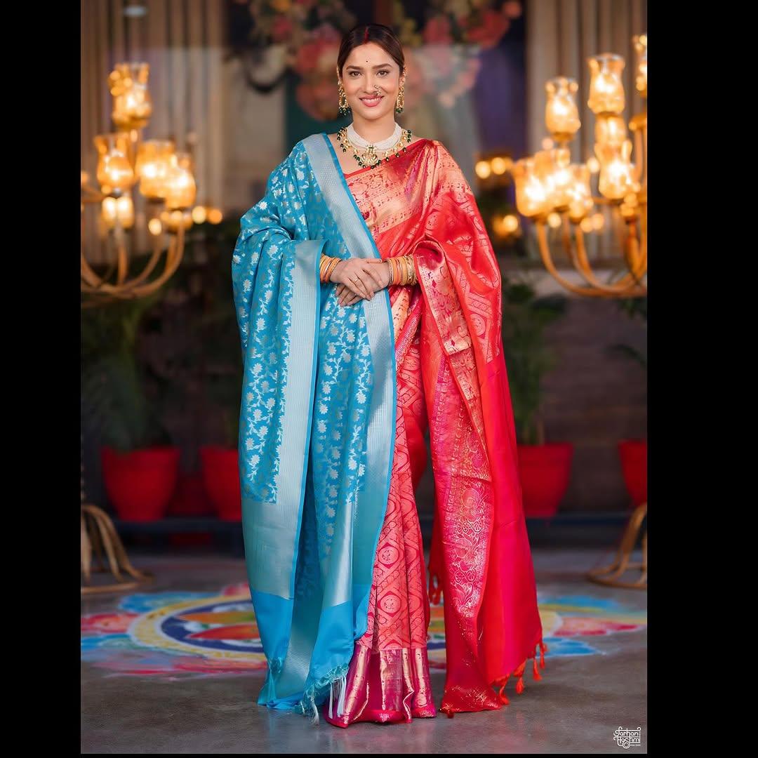In this look, Ankita Lokhande looked drop-dead gorgeous as she wore a stunning pink saree with golden embroidery. She paired the saree with a beautiful contrasting blue shawl