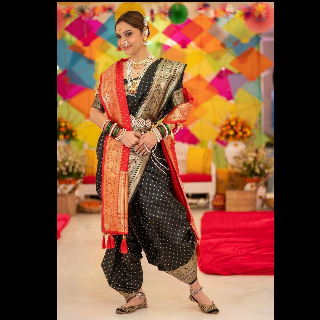 In this look, Ankita draped a stunning black saree with a golden border in perfect Marathi style, and she paired her saree with a contrasting red shawl