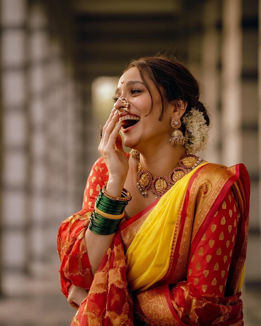 The actress tied her hair back in a bun, and the gajra elevated her look. She paired her saree with a stylish neckpiece, big jhumkas, green bangles, and a stylish kamarbandh