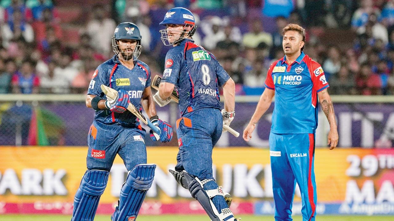 LSG’s Nicholas Pooran (left) and Mitchell Marsh during their 87-run partnership against DC in Vizag yesterday. Pic/PTI