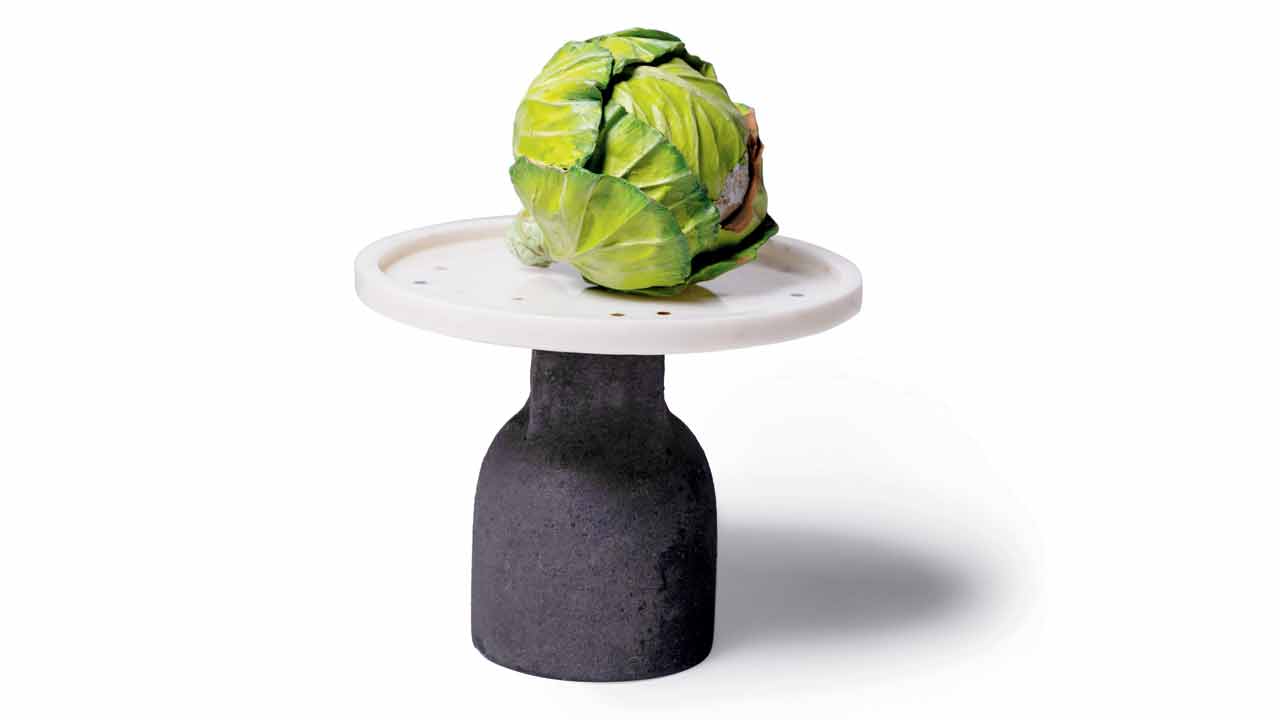 A terracotta cabbage vase