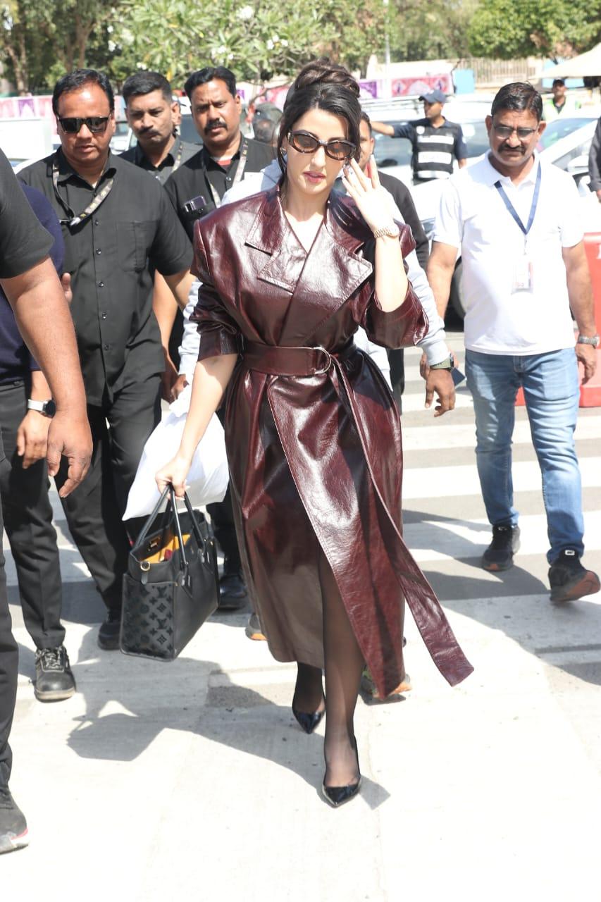 Nora Fatehi looked drop-dead gorgeous in a stylish brown leather trench coat for her airport look