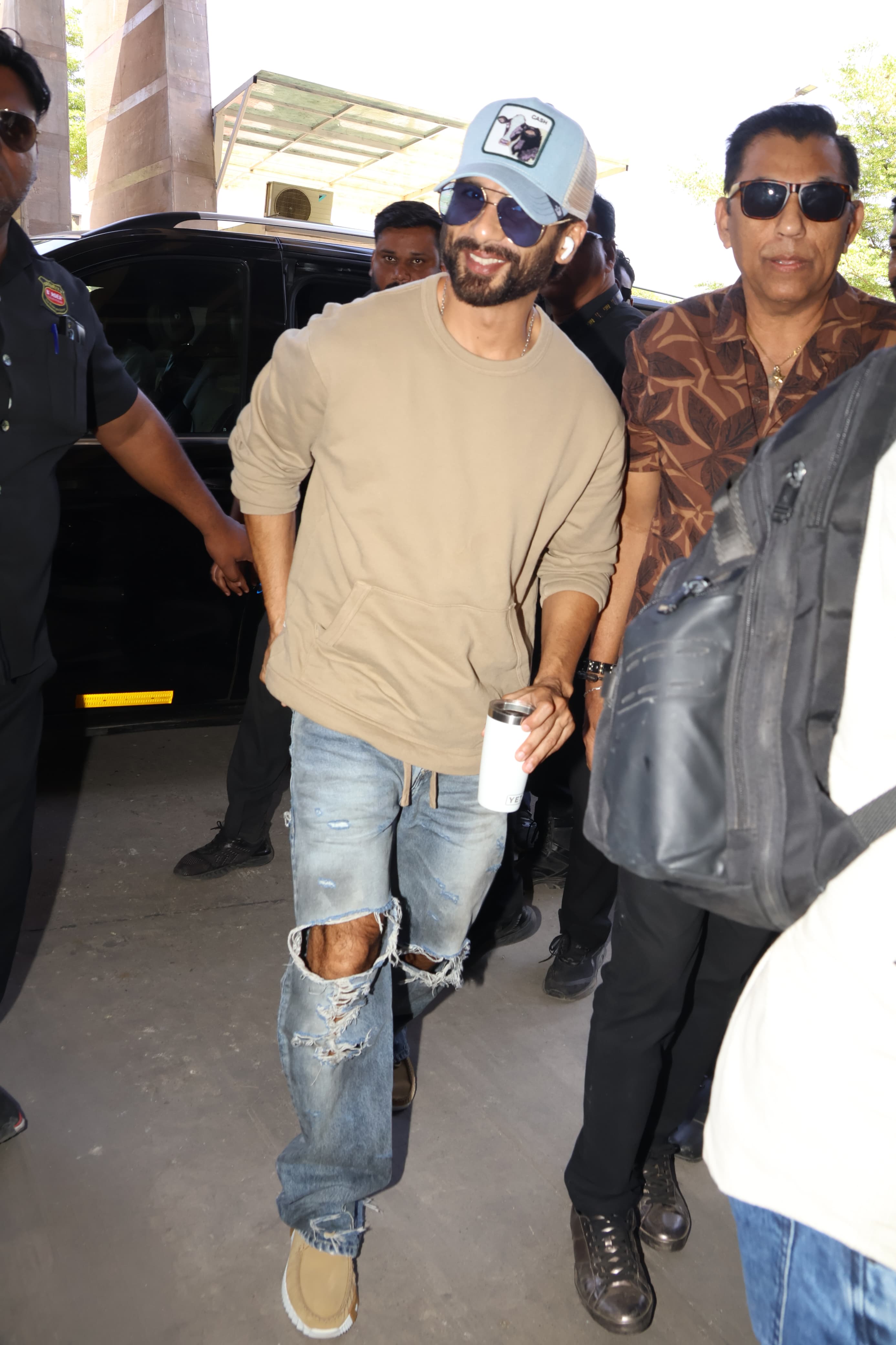 Shahid Kapoor was seen smiling ear to ear as he arrived at Jaipur airport to jet off after giving a banger performance at IIFA 2025