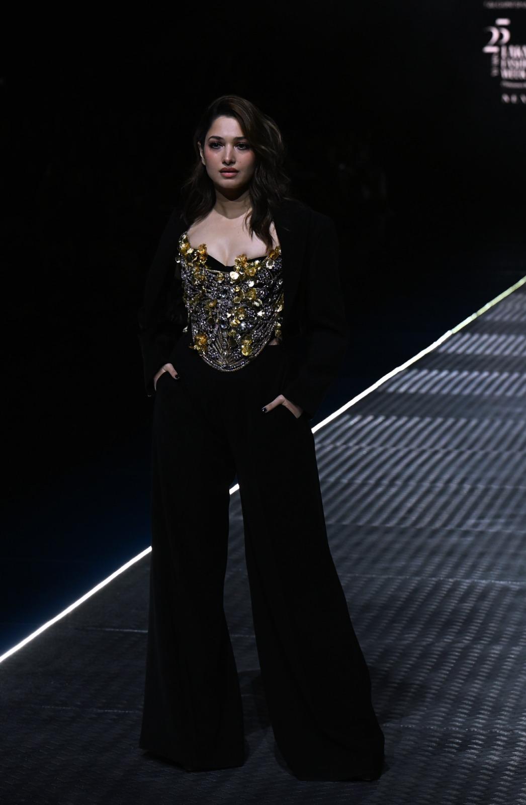 Alongside Karan, actor Tamannaah Bhatia also grabbed attention with her stunning attire as she walked the ramp for Falguni Shane Peacock.
