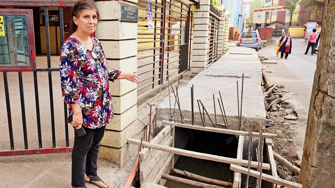 The Marigold building in Kalina, which is being impacted by an under-construction drain that rises above road level