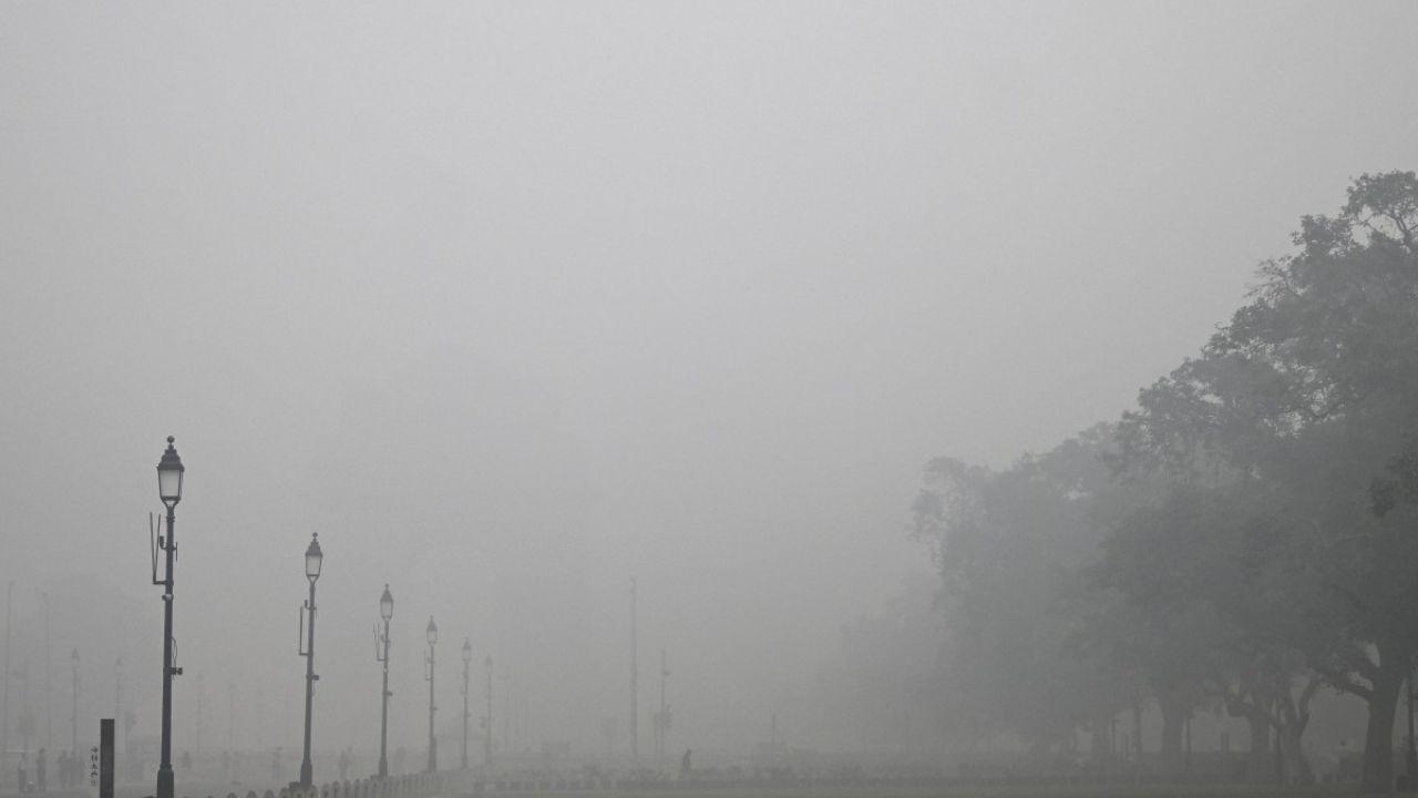 Thirteen of the world's 20 most polluted cities are in India, as per the World Air Quality Report 2024. Pic/ AFP and PTI