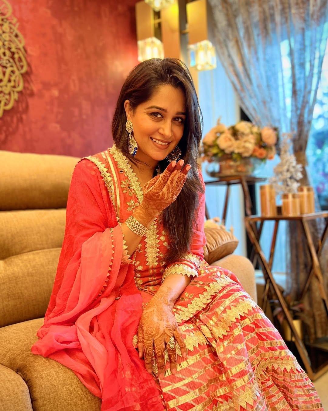 Wish to wear something that helps you stand out at the celebration? Then go for this stunning pink suit from Dipika's wardrobe