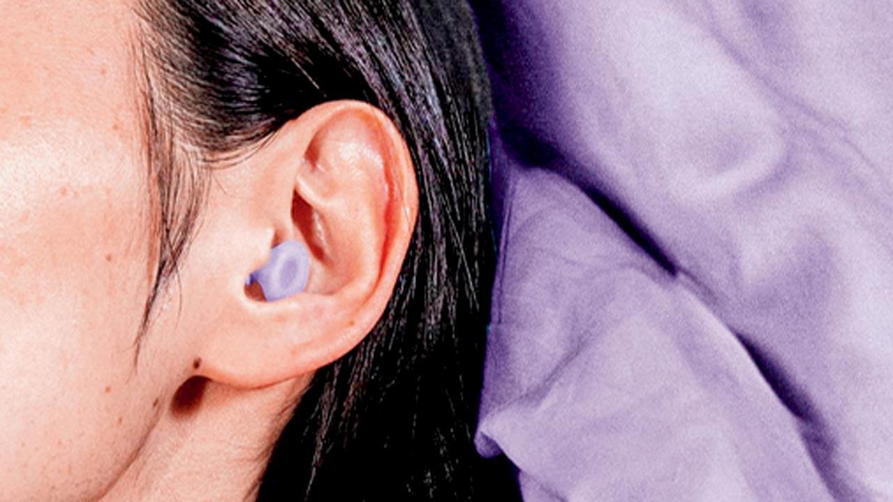 Noise-cancelling earplugs can come in handy for light sleepers