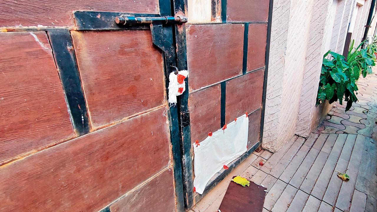 The sealed entrance of Madhuban bungalow, the Shahs’ residence, at Lokhandwala West on March 21. Pic/Nimesh Dave