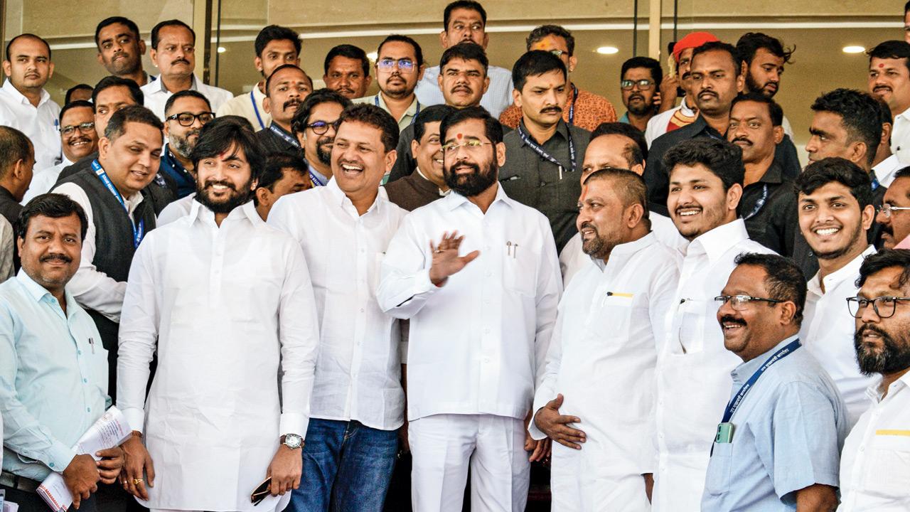 Dy CM Eknath Shinde (centre) with party leaders at Vidhan Bhavan on Thursday. Pic/PTI