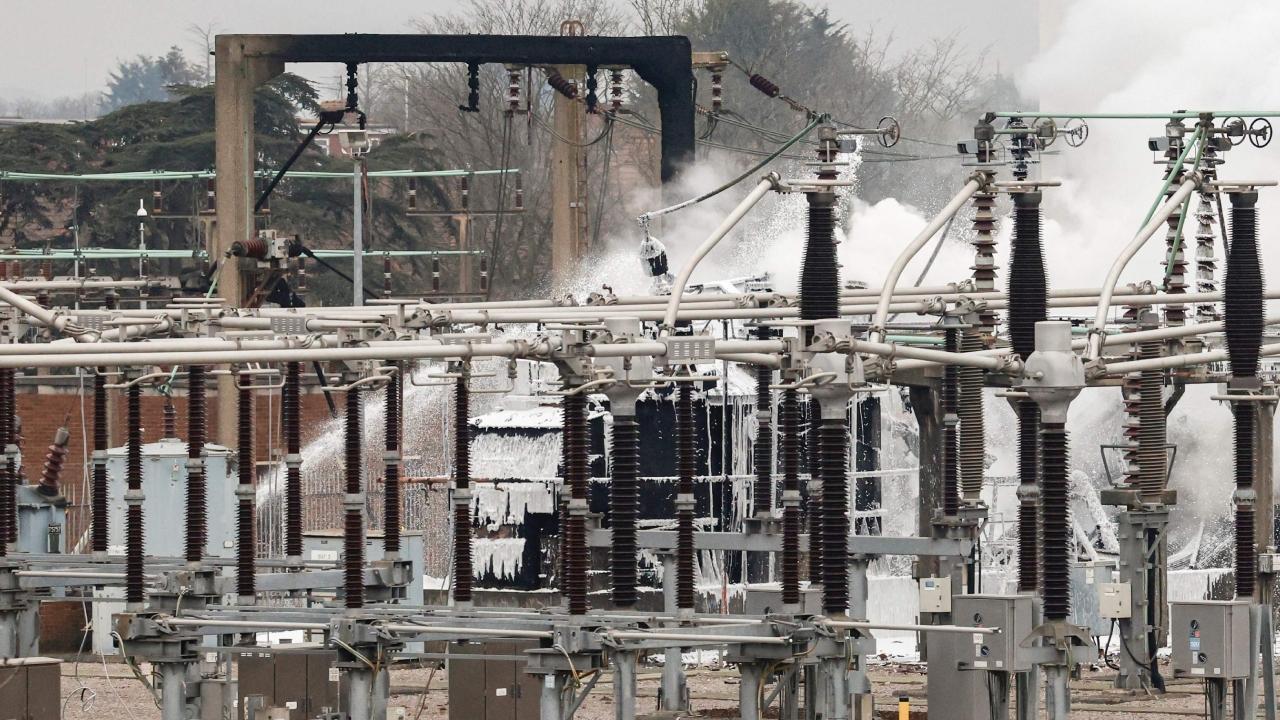 The fire at a power station about 2 miles from the airport was brought under control about seven hours after it erupted in a ball of flames, the London Fire Brigade said