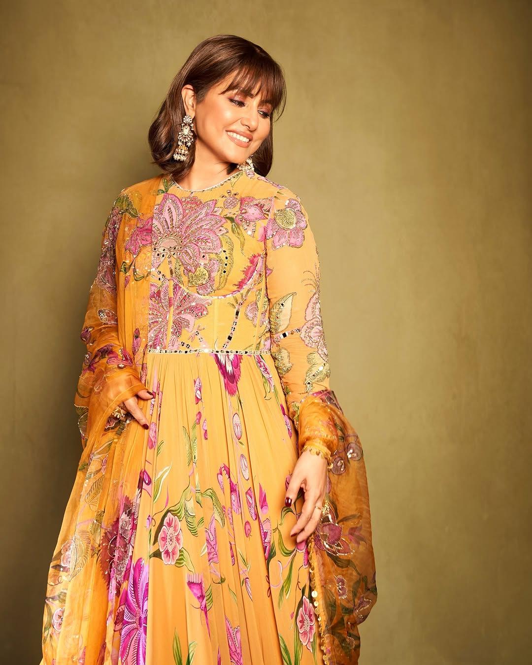 Fan of lightweight but embroidered outfits? We have a solution for you as well. In yet another stunning appearance, Hina Khan wore a beautiful long, floor-length yellow-coloured suit.