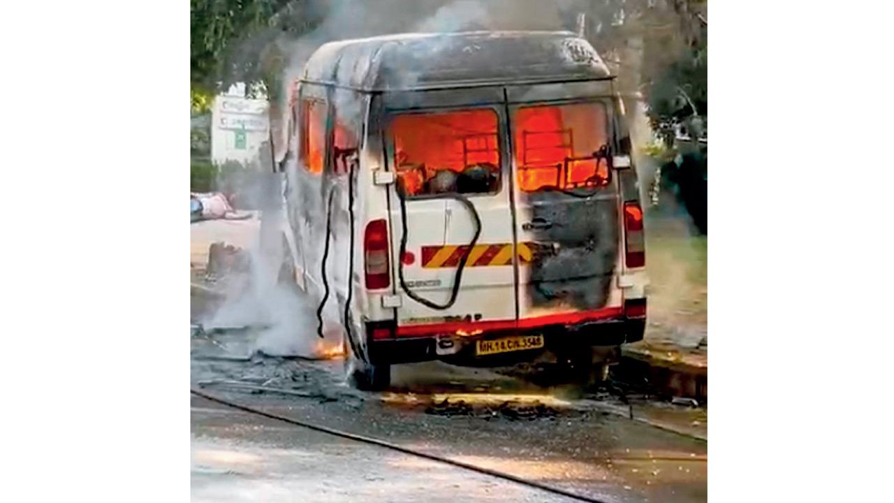 A tempo traveller was allegedly set on fire while it was ferrying some employees of a company to their office, at Hinjewadi, near Pune, Wednesday, March 19. Pic/PTI