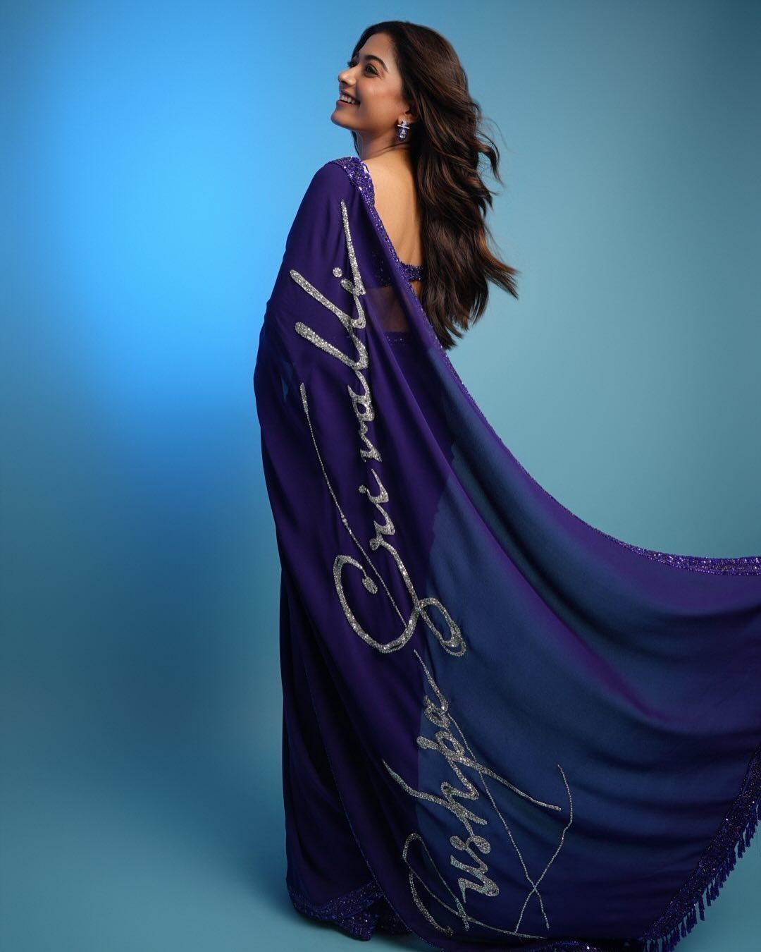Rashmika turned heads in a vibrant violet saree that exuded grace and sophistication with its intricate weaving