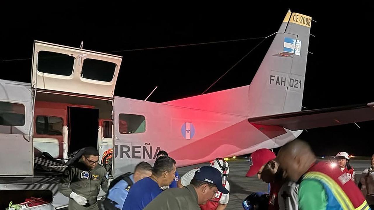 IN PHOTOS: 12 killed after plane crashes off Honduran island