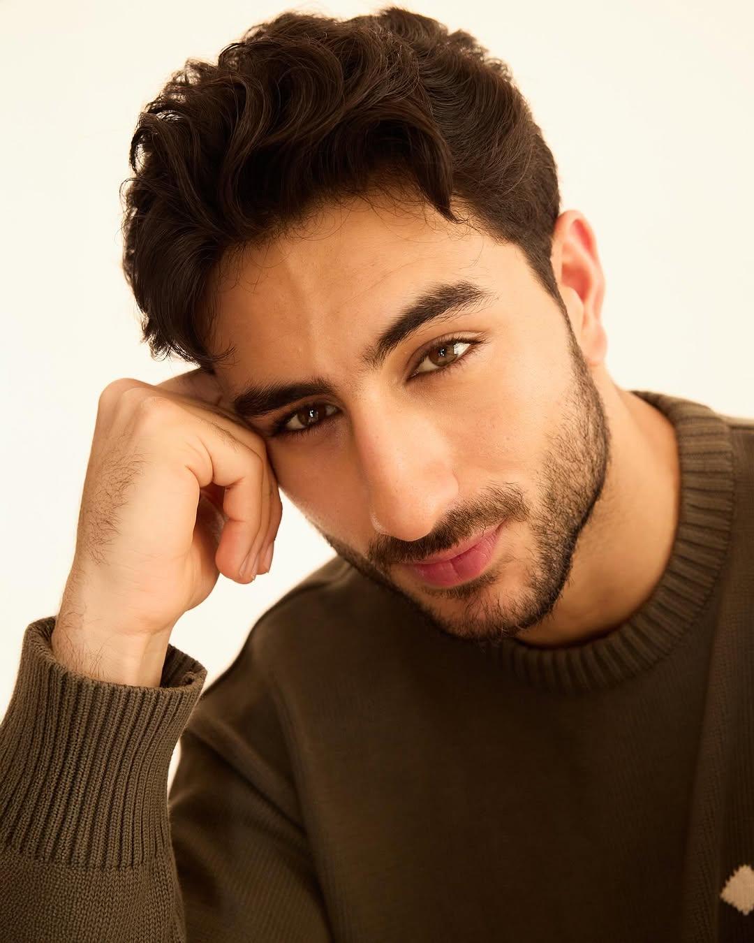 Ibrahim Ali Khan looked irresistibly charming and adorable in a brown sweater t-shirt that perfectly highlighted his relaxed yet stylish vibe