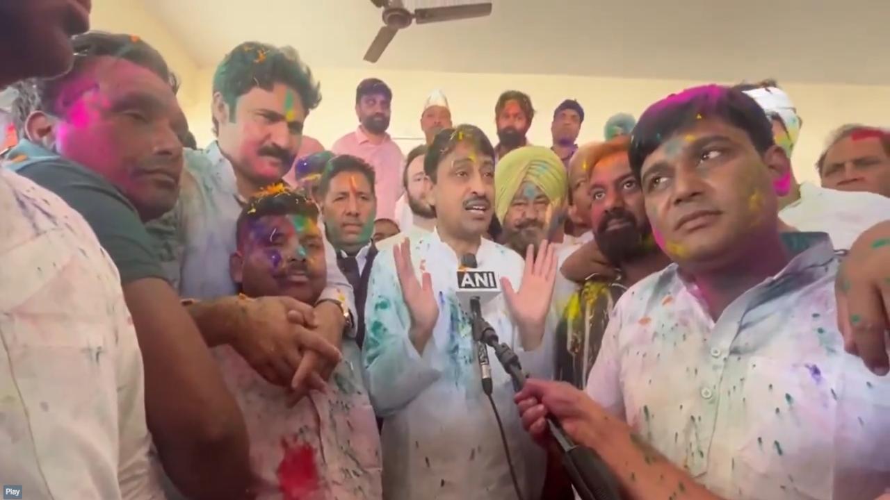 Congress MP Imran Masood celebrated Holi at his residence in Saharanpur, Uttar Pradesh, on Friday and said he was doing so to spread a message of love