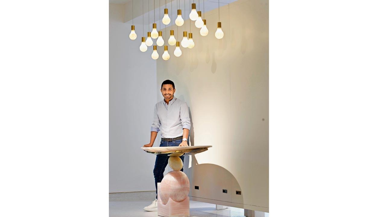 Shroff beside a creation from his Balance series at the Ballard Estate gallery