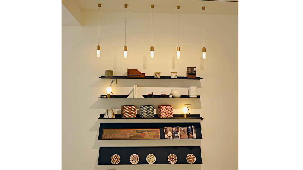 White walls and mosaic flooring provide a bright, blank canvas for the designs in the gallery