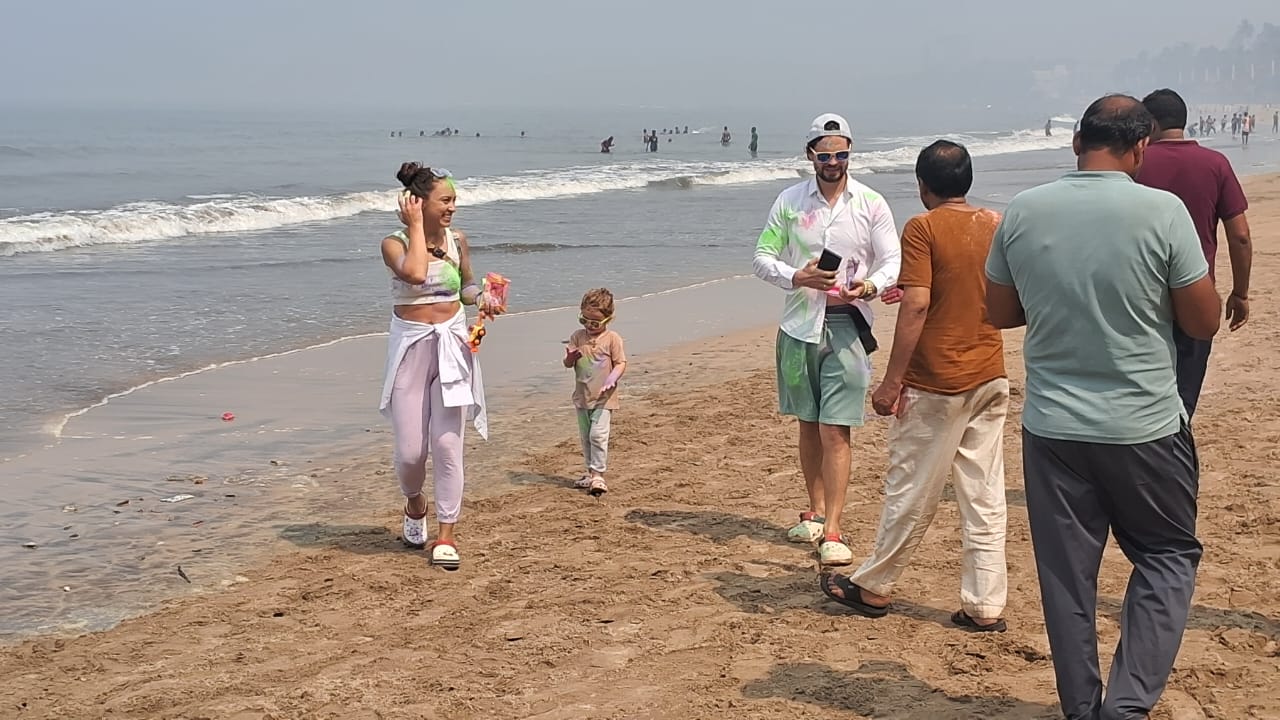 To ensure safety and order, the Mumbai Police has made special arrangements throughout the day. Officers, covered in colours themselves, were also seen laughing and joking with the crowd while promoting safe play.