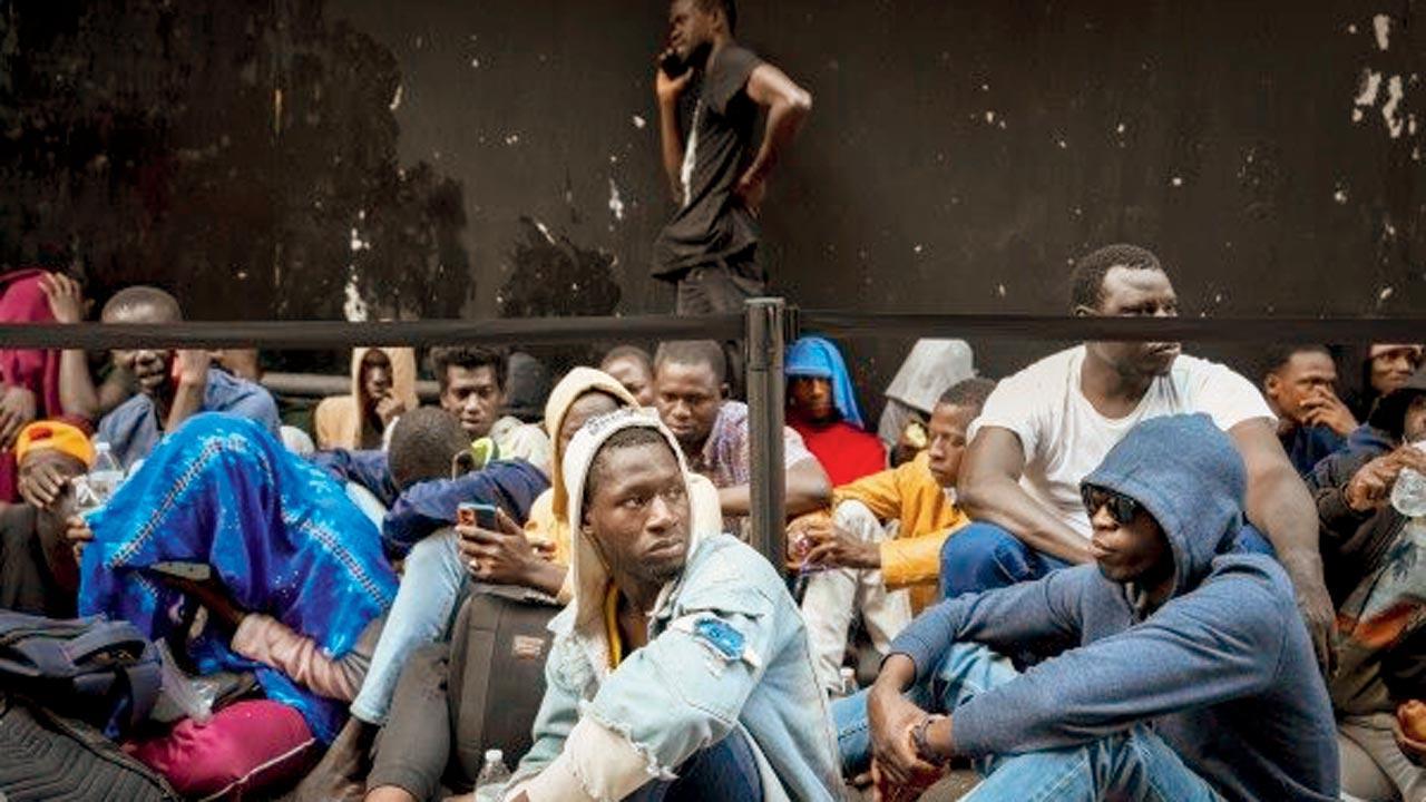 Migrant boats capsize; at least 186 missing