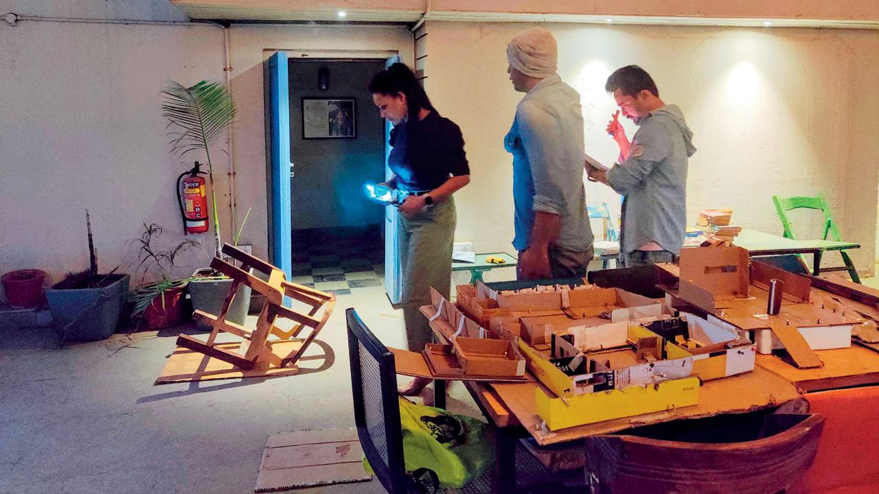 The crew works on recreating the miniature cardboard model (right, on table) in Goregaon. PICS COURTESY/THE ONLY GODESS PRODUCTION